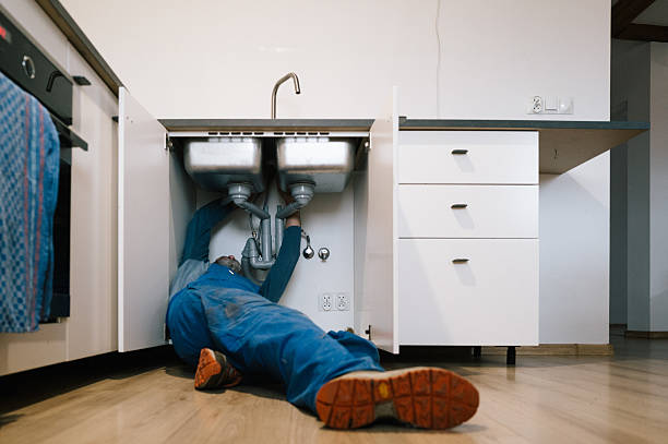 Professional Plumbing technician working in Mallie, KY